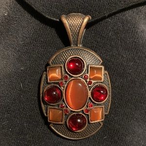 Necklace, copper base with 4 red glass stones, and 5 orange cat eyes $29